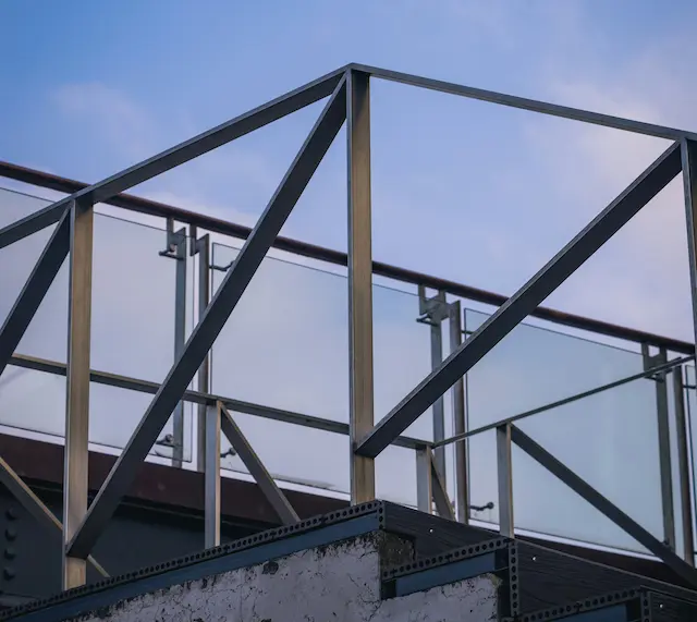 Steel stair frame with railing made of structural steel sections